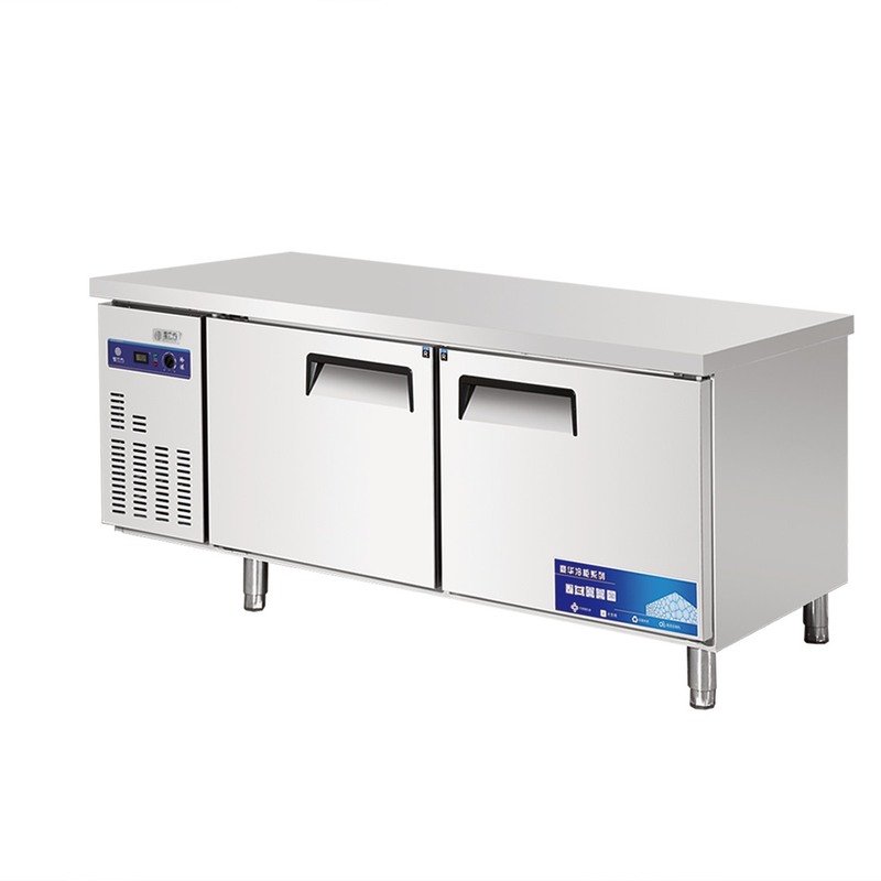 Stainless steel commercial refrigerator workbench in the back kitchen of hotel restaurant